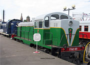 A green and gray industrial diesel loco