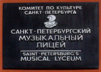 plaque on the wall of the right front facade